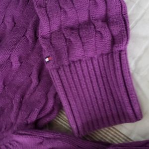 Like new Tommy Hilfiger v neck sweater.  Logo on one sleeve
